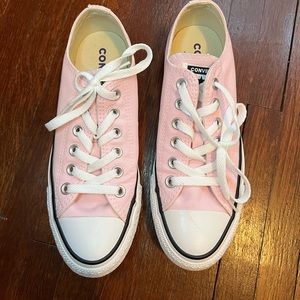 Converse Chuck Taylor All Star Lo Sneakers. Color is Pink Foam